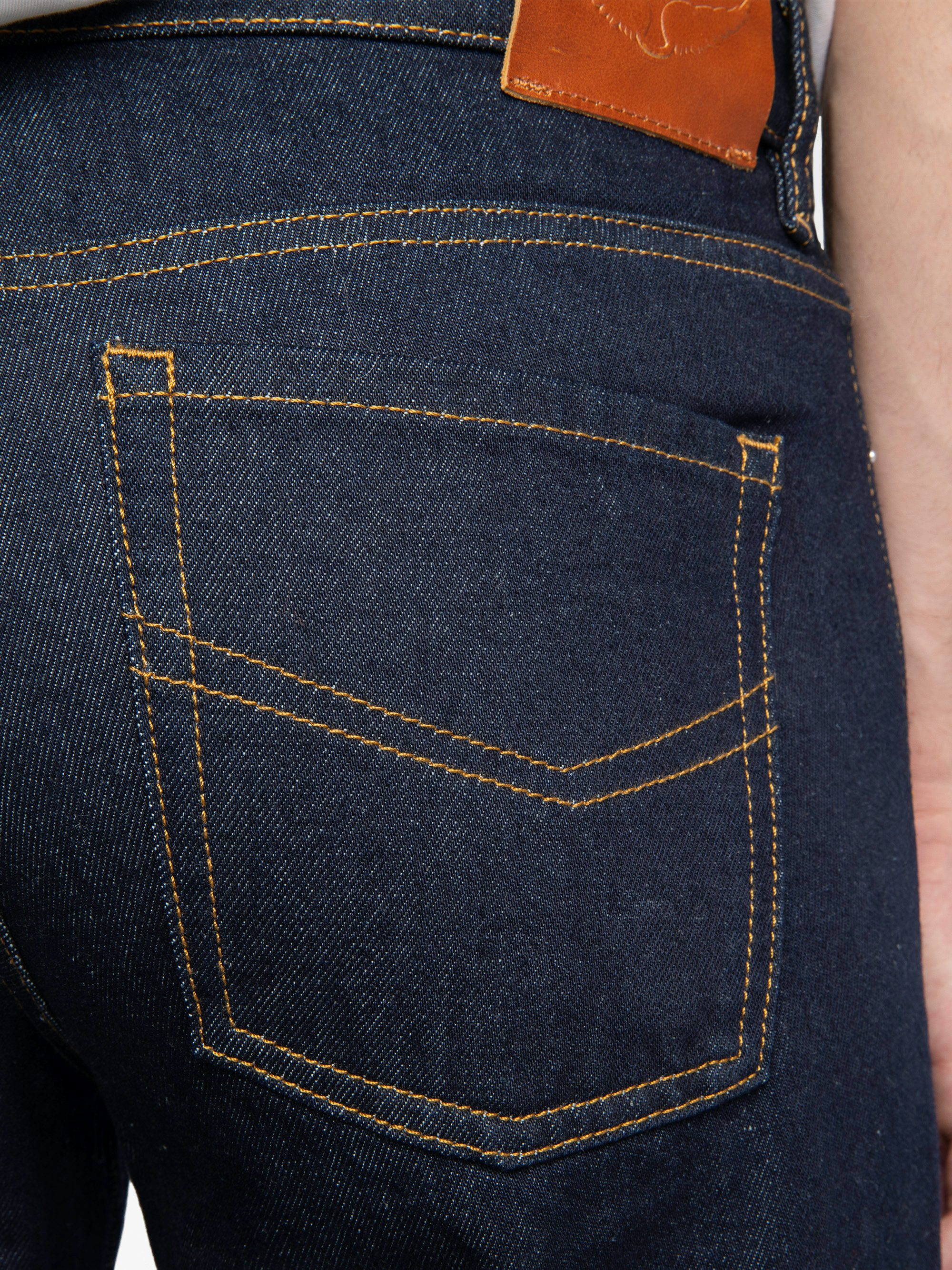 Jean John - Straight raw denim jeans with zip fastening.